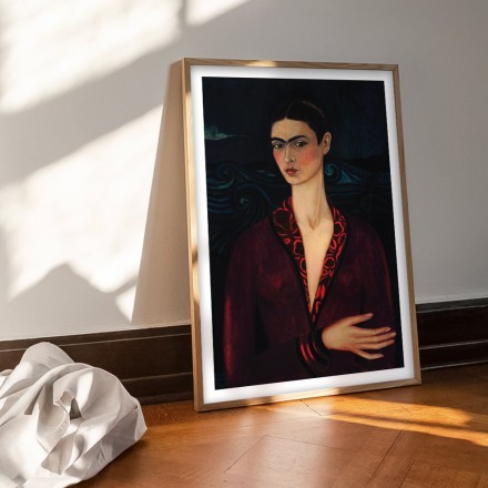 Frida Kahlo in a dark red dress