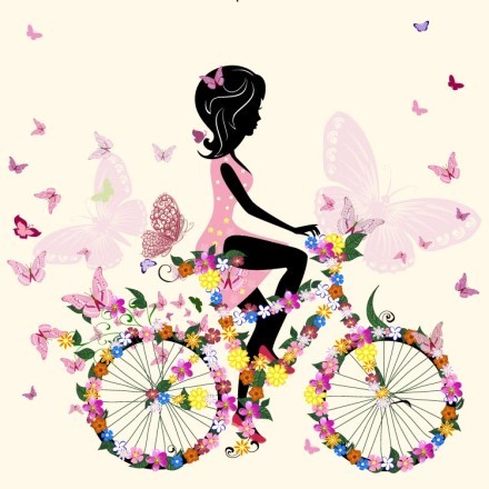 Κορίτσι σε ποδήλατο με λουλούδια