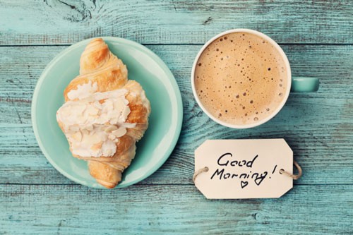 Coffee mug with croissant